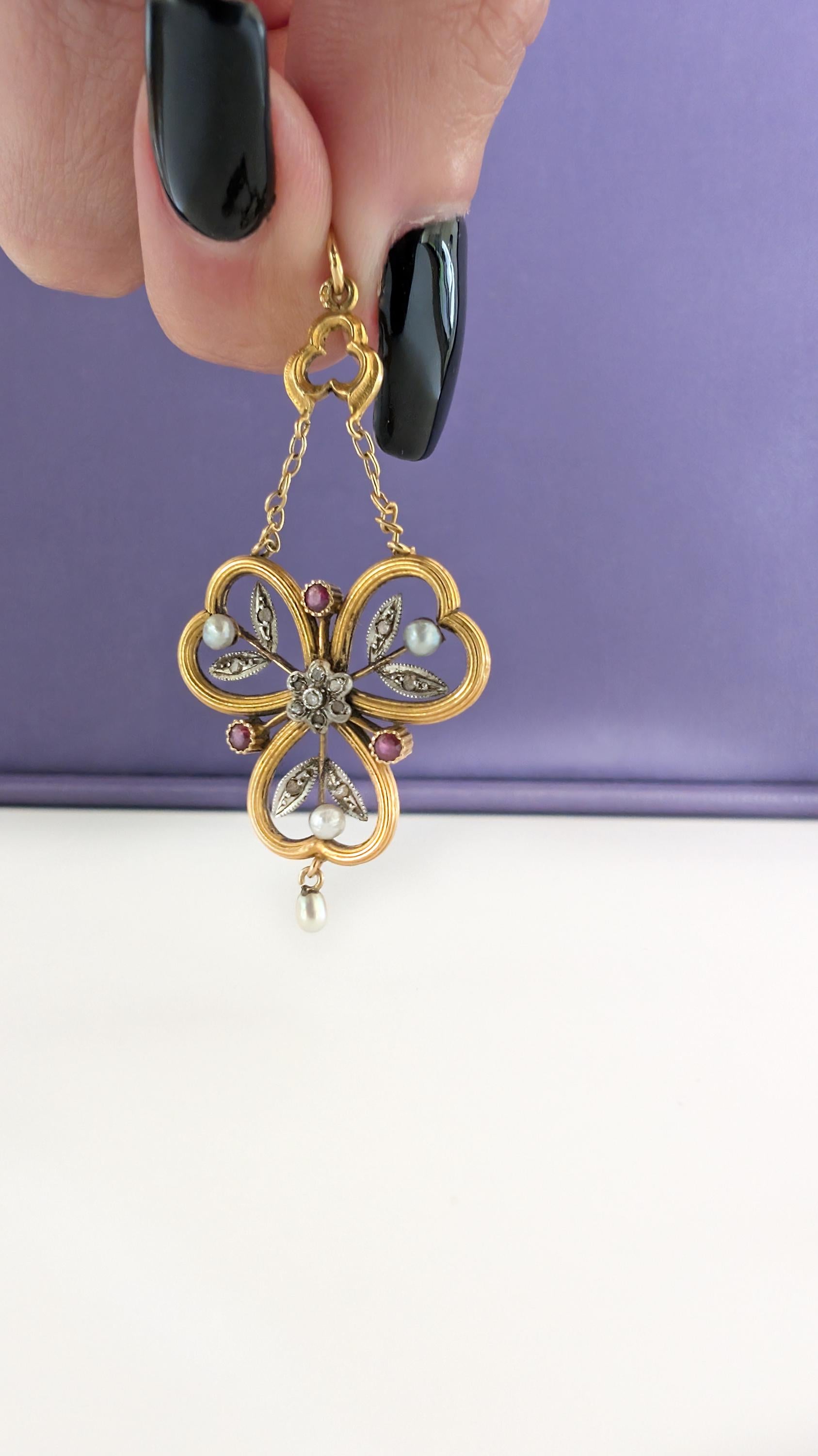 vintage gold pendant

pearl pendant

Mothers day gift

gift for wife

Gift for her

estate jewelry

cluster pendant

1900s pendant

18K vintage pendant

18K ruby pendant

18K pendant

18K pearl pendant